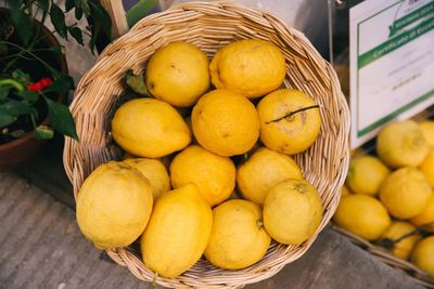 Close-up of fruits in basket on table