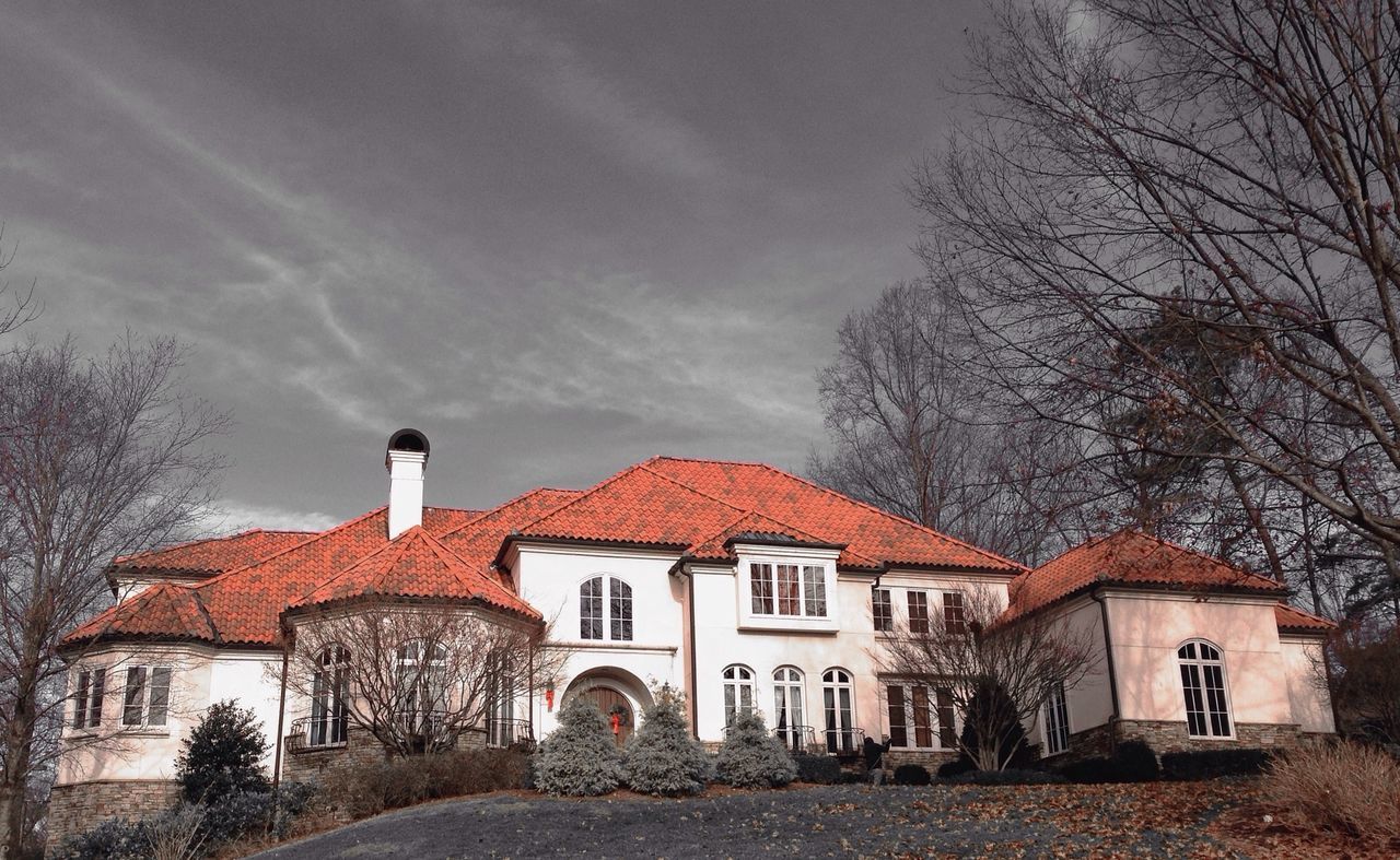 architecture, building exterior, built structure, tree, house, sky, bare tree, residential structure, residential building, cloud - sky, window, weather, street, day, outdoors, road, no people, facade, the way forward, overcast