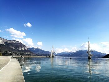 Scenic view of lake against blue sky