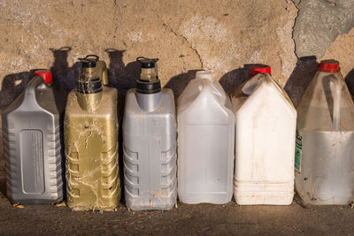 Close-up of bottles in row