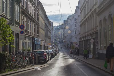 People walking on street in city