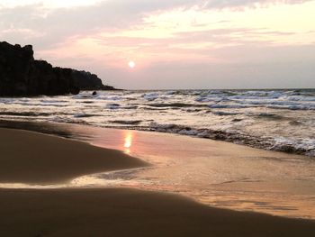 Scenic view of beach during sunset