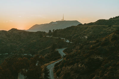 Scenic view of hollywood mountains against sky during sunset