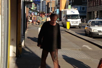 Man walking in city