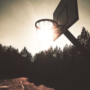 Low angle view of basketball hoop against sky