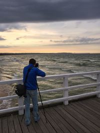 Scenic view of sea against cloudy sky