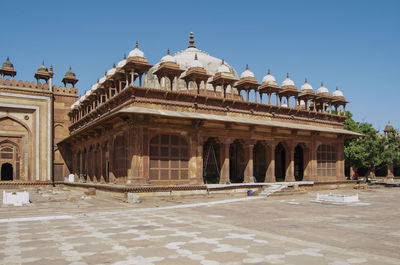 Low angle view of historical building against clear sky