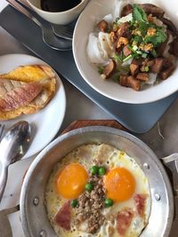 High angle view of breakfast served on table