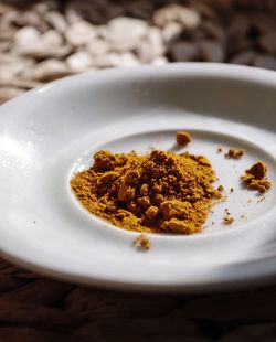 Close-up of spice in plate on table