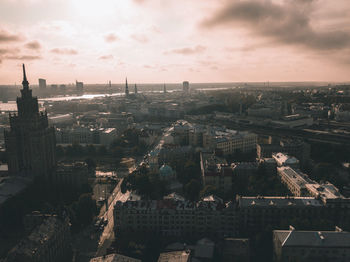 High angle view of city buildings during sunset