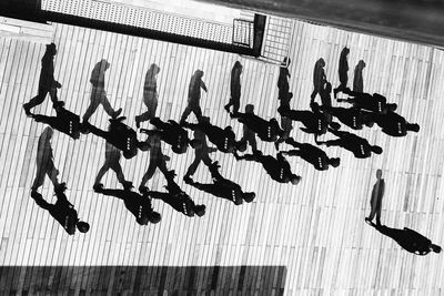 High angle view of police force marching on sunny day