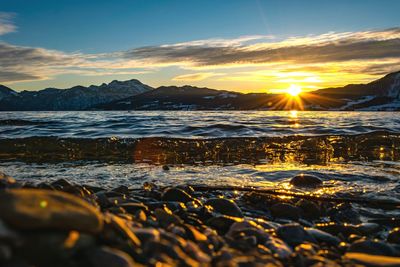 Scenic view of sea against sky during sunset