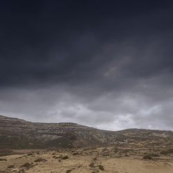 Scenic view of desert against sky