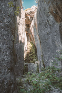 Low angle view of rock formation on mountain