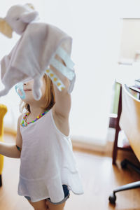 Portrait of cute baby girl at home