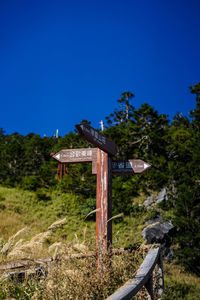 Scenic view of mountains against clear blue sky