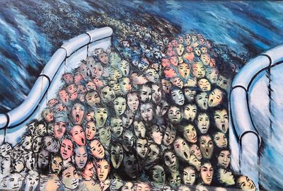 Low section of people at sea shore