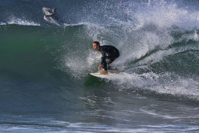 Man surfing in sea