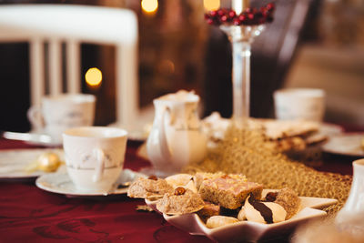 Close-up of food and drink on table during christmas