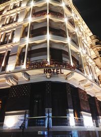 Low angle view of illuminated building at night