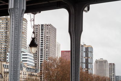 The buildings of the 15th arrondissement from the bir hakeim bridge in paris - france