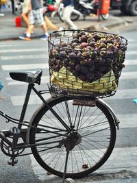 Bicycle in basket on street