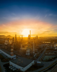 High angle view of cityscape against sky during sunset