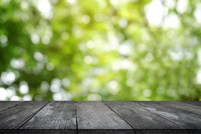 Close-up of wooden table in park