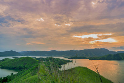 Scenic view of landscape against sky during sunset