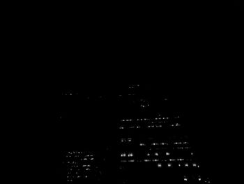 Illuminated buildings in city at night