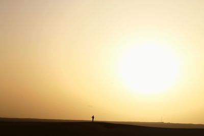 Scenic view of silhouette landscape against sky during sunset