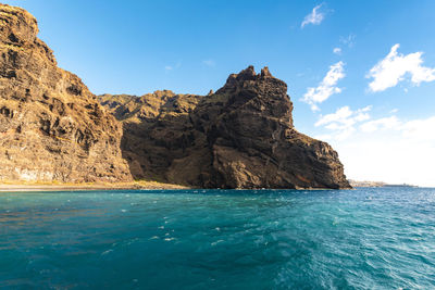 Beach of los gigantes view from a boat