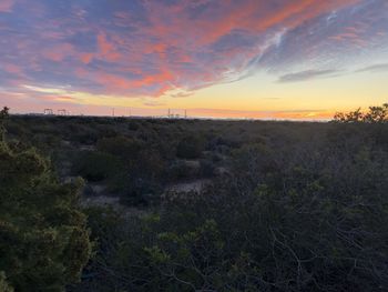 Scenic view of landscape against sky during sunset