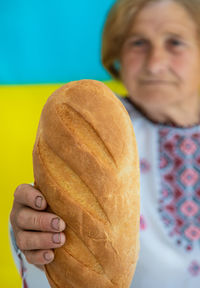 Close-up of hand holding bread