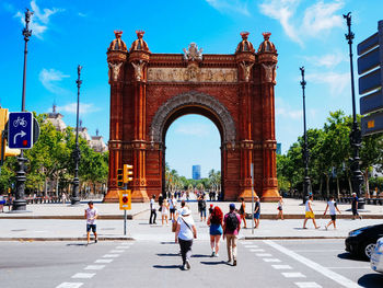 People in front of historical building