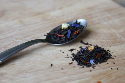 Close-up of tea leaves on table