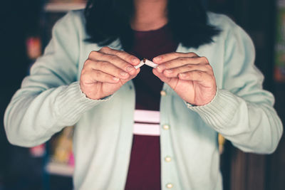 Close-up of woman holding hands