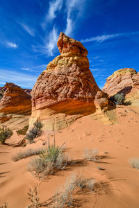 Scenic view of rock formations against sky