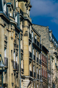 Low angle view of residential building against sky