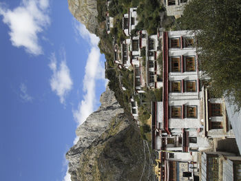 Low angle view of buildings in city against sky