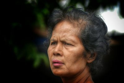 Close-up of confused mature woman