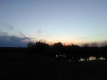 Scenic view of landscape at sunset