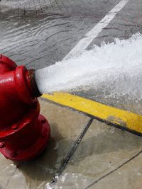High angle view of red splashing water