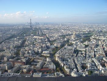 High angle view of city buildings against sky