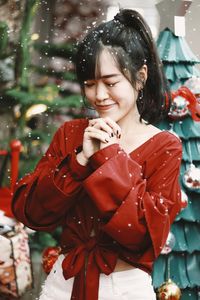 Happy girl with red umbrella