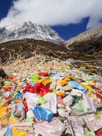 Prayer flags against snowcapped mountains