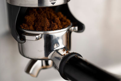 A closeup shot of an espresso coffee machine