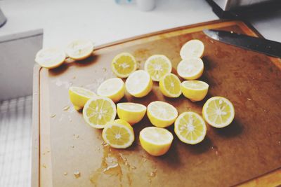 High angle view of fruits on cutting board