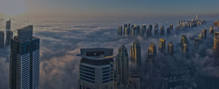 Panoramic view of skyscrapers against sky