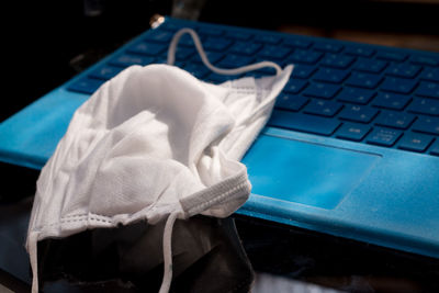 Close-up of mobile phone on table